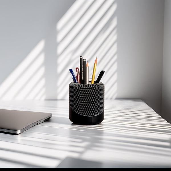 NeoMesh desk organizer holding pens and stationery on a workspace